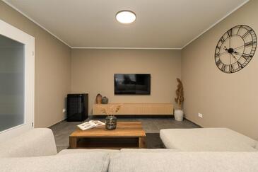 Poreč, Living room in the apartment, air condition available and WiFi.