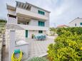 Slatine, Čiovo, Propiedad 24692 - Apartamentos con una playa de guijarros.