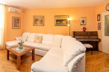 Split, Living room in the apartment, air condition available and WiFi.