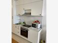Zagreb, Cocina en alojamiento de tipo studio-apartment.