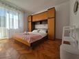 Rab, Sypialnia 2 w zakwaterowaniu typu apartment, zwierzęta domowe są dozwolone i WiFi.