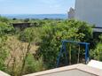 Punat, Krk, Giardino 24812 - Appartamenti affitto con la spiaggia ghiaiosa.