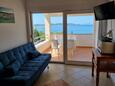 Drage, Living room in the apartment, air condition available, (pet friendly) and WiFi.