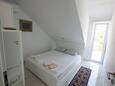 Hvar, Bedroom in the apartment, air condition available and WiFi.