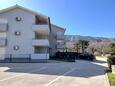 Baška, Krk, Parkolóhely 25018 - Apartmanok kavicsos stranddal.