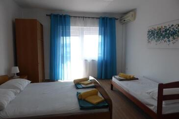 Apartments with parking space Senj - 25395