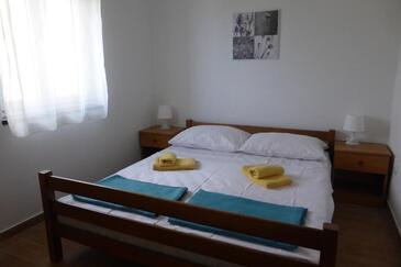 Apartments with parking space Senj - 25395