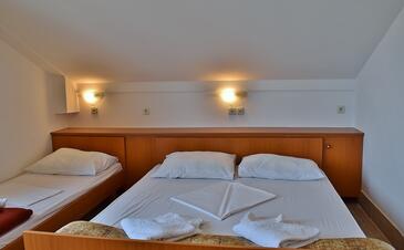 Апартаменти біля моря Баньол - Banjol, Раб - Rab - 25541