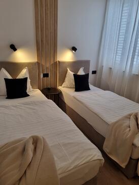 Apartments by the sea Lopar, Rab - 25689