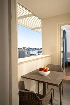 Apartmanok családok részére medencével Rozac, Umag - 27246