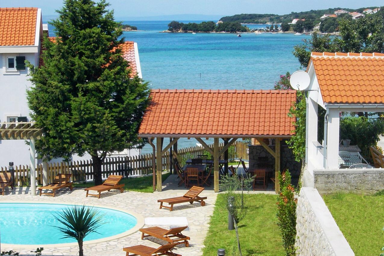 Family friendly apartments with a swimming pool Kampor, Rab - 3214