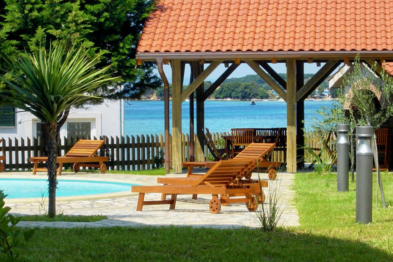Seaside family friendly house with a swimming pool Kampor, Rab - 3216