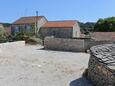 Lumbarda, Korčula, Parkeerplaats 4472 - Appartementen with pebble beach.