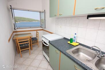 Nečujam, Dining room in the studio-apartment, air condition available and WiFi.