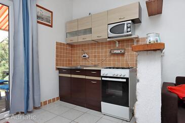 Apartments with parking space Senj - 5571