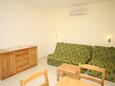 Baška Voda, Woonkamer in accommodatietype apartment, airconditioning beschikbaar en WiFi.