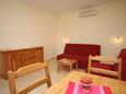Baška Voda, Woonkamer in accommodatietype apartment, airconditioning beschikbaar en WiFi.