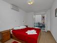 Baška Voda, Ložnice v ubytování typu apartment, s klimatizací a WiFi.