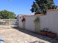 Valbandon, Fažana, Parkirišče 7257 - Apartmaji s prodnato plažo.