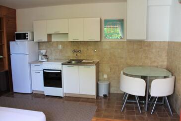 Apartments with parking space Senj - 7475