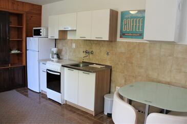 Apartments with parking space Senj - 7475