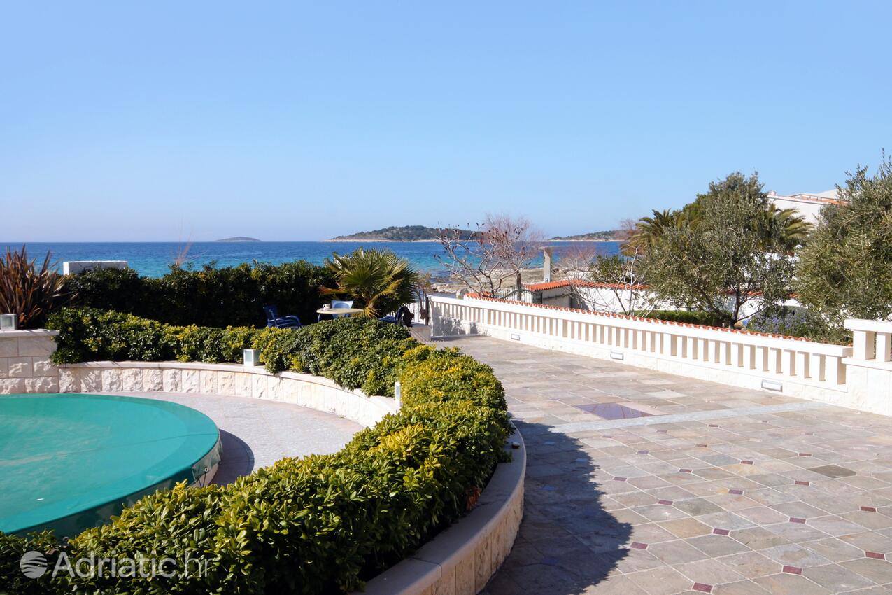 A-7557-a - Private accommodation - Family friendly apartments with a swimming pool Rogoznica