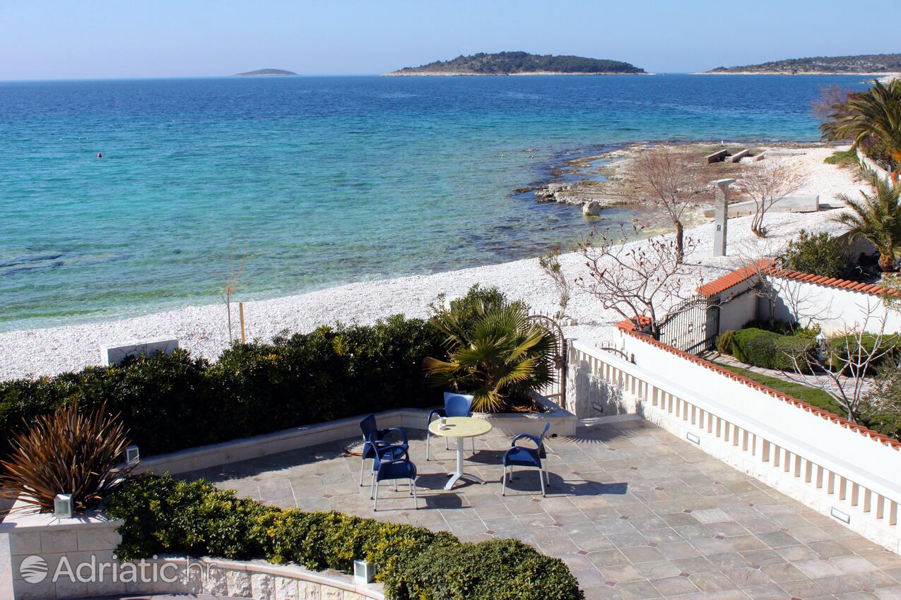 Courtyard - Family friendly apartments with a swimming pool Rogoznica