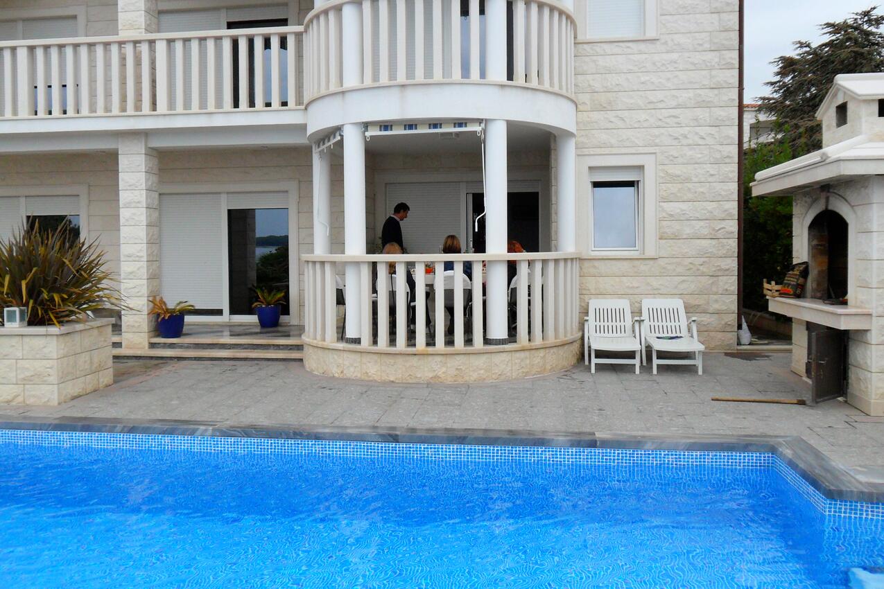 Courtyard - Family friendly apartments with a swimming pool Rogoznica