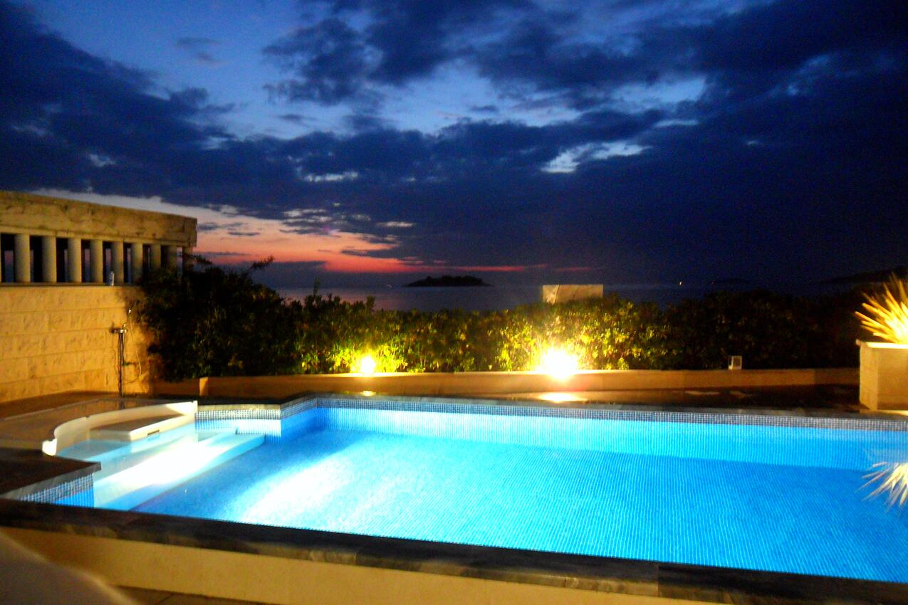 Courtyard - Family friendly apartments with a swimming pool Rogoznica