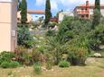 Sveti Jakov, Lošinj, Tuin 8011 - Appartementen met een kiezelstrand.