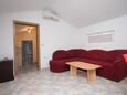 Woonkamer Preko, Woonkamer in accommodatietype apartment, airconditioning beschikbaar en WiFi.