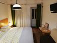 Cavtat, Спальня 1 в розміщенні типу studio-apartment, доступний кондиціонер і WiFi.