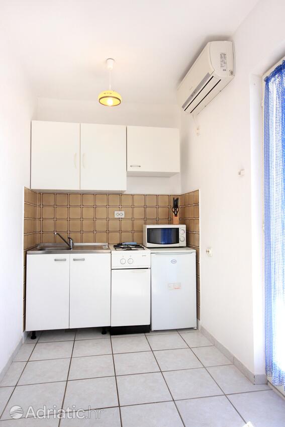 Apartmani uz more Stara Novalja, Pag - 9368